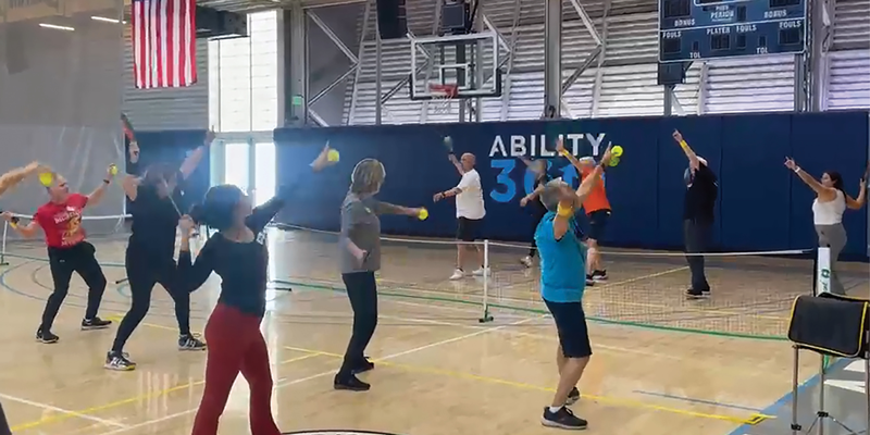 Pickleball players warming up