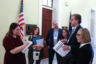 PT advocates gather in the hallway on Capitol Hill