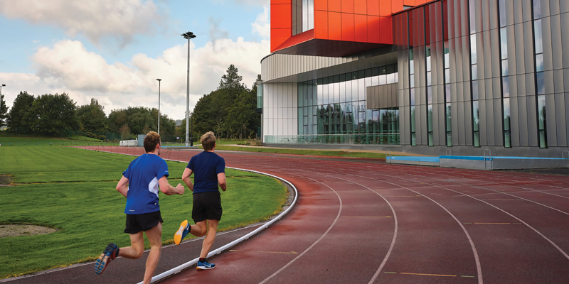 Two runners on a track