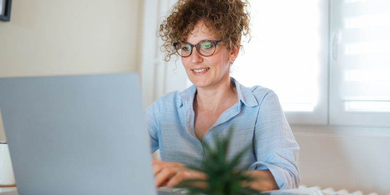 A woman reading her computer